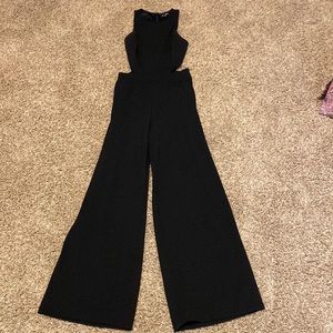 Express black jumpsuit with wide leg and side cutouts
